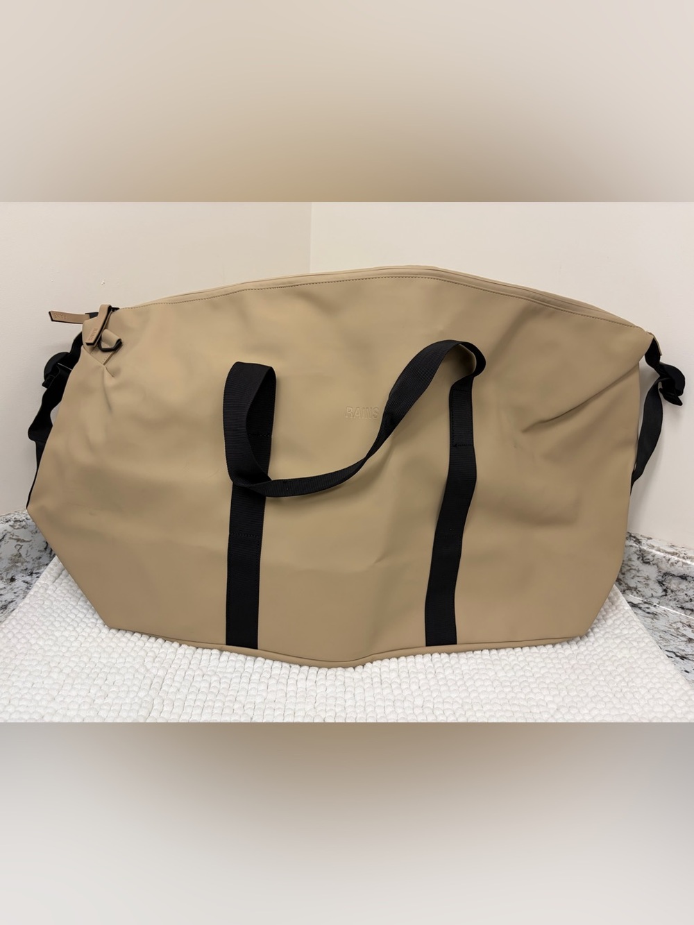 Rains Tan Duffel Bag with Black Straps